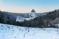 Beautiful gothic Royal Karlstejn Castle in winter with snow,Czech Republic.Founded by Charles IV.There are Czech crown jewels, Royalty Free Stock Photo