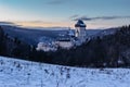 Beautiful gothic Royal Karlstejn Castle in winter with snow,Czech Republic.Founded by Charles IV.There are Czech crown jewels, Royalty Free Stock Photo