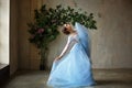 Beautiful graceful girl ballerina in blue dress dancing in point Royalty Free Stock Photo