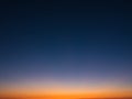 Beautiful gradient sky at dusk, from dark blue to orange Royalty Free Stock Photo