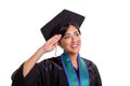 Beautiful graduate student hand salute gesture sideways, isolated on white Royalty Free Stock Photo