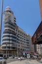 Beautiful Gran Via at your step through the Callao Square with the Callao metro and the Capitol building on the Gran Via in Madrid