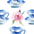 Beautiful graphic lovely artistic tender wonderful blue porcelain china tea cups with lovely pink roses flowers pattern Royalty Free Stock Photo