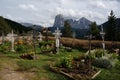 Beautiful graveyard in the mountains with splendid view to distinctiv mountain Royalty Free Stock Photo