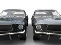 Beautiful gray and dark blue vintage American muscle cars - front view closeup shot Royalty Free Stock Photo