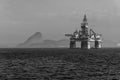 Beautiful grayscale landscape shot of an oil extraction platform