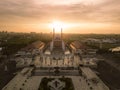 Beautiful great mosque which have towers and big hall with orange sunset sky