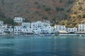 Beautiful Greek blue and white houses on the shores of Crete in the Mediterranean