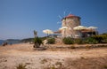 A beautiful Greek cafe building in the form of a mill to attract tourists in the summer season to the island of Kastos Royalty Free Stock Photo