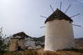 Landscape with two windmills at the charming Greek island of Ios.