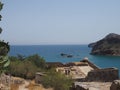 Beautiful greek summer sunny beach bay view to mediterranean blue sea awesome turquoise water like paradise with small white house Royalty Free Stock Photo