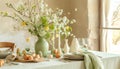 Beautiful green and beige colors morning table decoration with lace tablecloth and napkins, pinky rose flowers, silver tableware