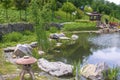 Beautiful green botanical landscape design in garden, city park with trees, bushes and benches, wooden gazebo Royalty Free Stock Photo