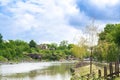 Beautiful green botanical landscape design in garden, city park with trees, bushes and benches, wooden gazebo Royalty Free Stock Photo