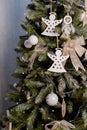 Beautiful green christmas tree decoration with toys and ribbons