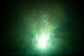 Beautiful green color light beam at night . smoke texture spotlight . screening abstract background . Royalty Free Stock Photo