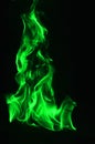 Beautifu green fire flames on a black background. Royalty Free Stock Photo