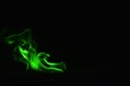 Beautifu green fire flames on a black background. Royalty Free Stock Photo