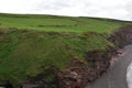 Beautiful Green Grass Field On Top of Sea Cliffs on the Irish Sea