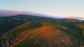 Beautiful green hills cloudy summer. Aerial view mountain slopes lush greenery Royalty Free Stock Photo