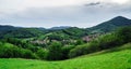 Beautiful green hills in little village Royalty Free Stock Photo