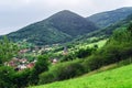 Beautiful green hills in little village Royalty Free Stock Photo