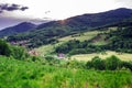 Beautiful green hills in little village Royalty Free Stock Photo