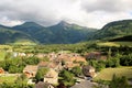 Beautiful green landscape of old town in France, Alpine with old small buildings with tiled roofs Royalty Free Stock Photo