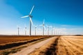 Beautiful green meadow with Wind turbines generating electricity Royalty Free Stock Photo