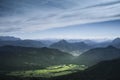 Beautiful green mountainous landscape with hills under a cloudy sky Royalty Free Stock Photo