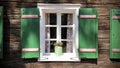 Beautiful green shutters and white window on typical and traditional austrian alpine wooden house - Salzkammergut Royalty Free Stock Photo