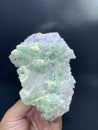 Beautiful green tourmaline elbaite bluster with lepidolite and quartz mineral specimen from Afghanistan Royalty Free Stock Photo