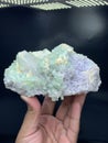 Beautiful green tourmaline elbaite bluster with lepidolite and quartz mineral specimen from Afghanistan Royalty Free Stock Photo