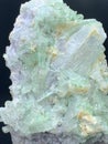 Beautiful green tourmaline elbaite bluster with lepidolite and quartz mineral specimen from Afghanistan Royalty Free Stock Photo