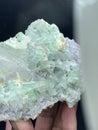 Beautiful green tourmaline elbaite bluster with lepidolite and quartz mineral specimen from Afghanistan Royalty Free Stock Photo