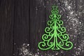 Beautiful greeting card with a Christmas tree green decoration