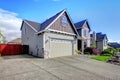 Beautiful grey house exterior with stone and driveway. Royalty Free Stock Photo