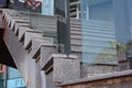 Beautiful grey stairs with tempered glass outdoors
