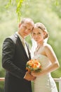 Beautiful groom and bride hold hands Royalty Free Stock Photo