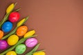 Beautiful group Easter eggs in the spring of easter day, red eggs, blue, purple and yellow on the brown background