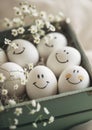 Beautiful group of smiling eggs stored in wooden box happy to see you this morning. Calm decoration with lace tablecloth and