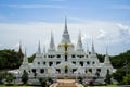 Beautiful group of white pagoda, Thutangkachedi, stupa with multiple spires of Wat Asokaram on sunny day