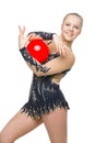 Beautiful gymnast girl with red ball Royalty Free Stock Photo
