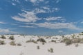 Beautiful gypsum dune vista at the White Sands National Park set against dramatic sky during the monsoon season, New Mexi