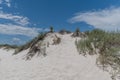 Beautiful gypsum dune vista at the White Sands National Park set against dramatic sky during the monsoon season, New Mexi