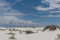 Beautiful gypsum dune vista at the White Sands National Park set against dramatic sky during the monsoon season, New Mexi