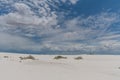 Beautiful gypsum dune vista at the White Sands National Park set against dramatic sky during the monsoon season, New Mexi