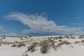 Beautiful gypsum dune vista at the White Sands National Park set against dramatic sky during the monsoon season, New Mexi