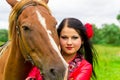 Beautiful gypsy girl with a horse Royalty Free Stock Photo