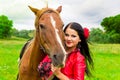 Beautiful gypsy girl with a horse Royalty Free Stock Photo